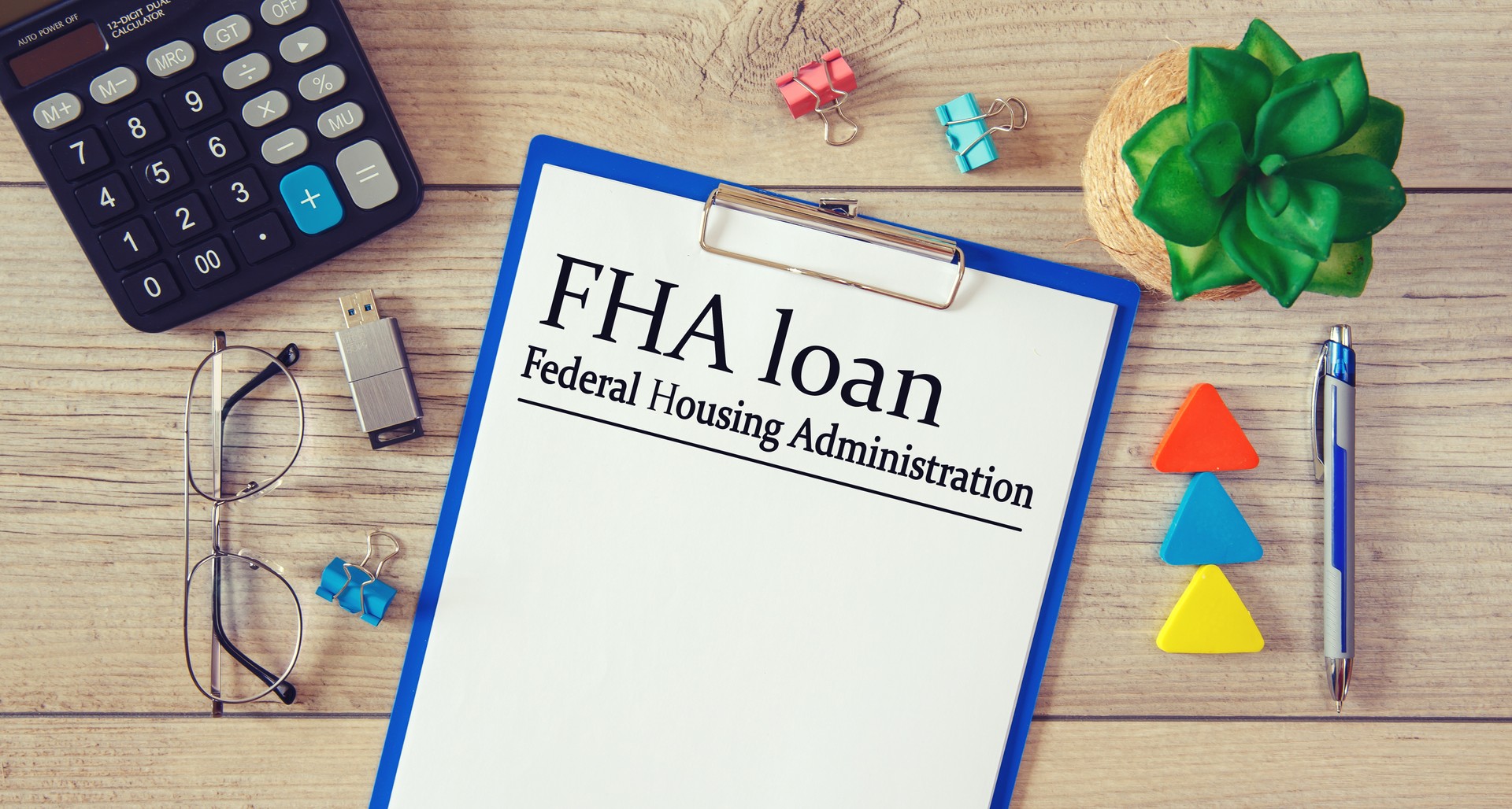 Paper with FHA loan - Federal Housing Administration on a table